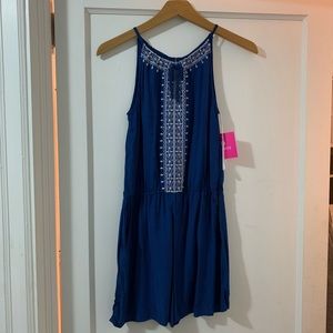 blue romper with white design